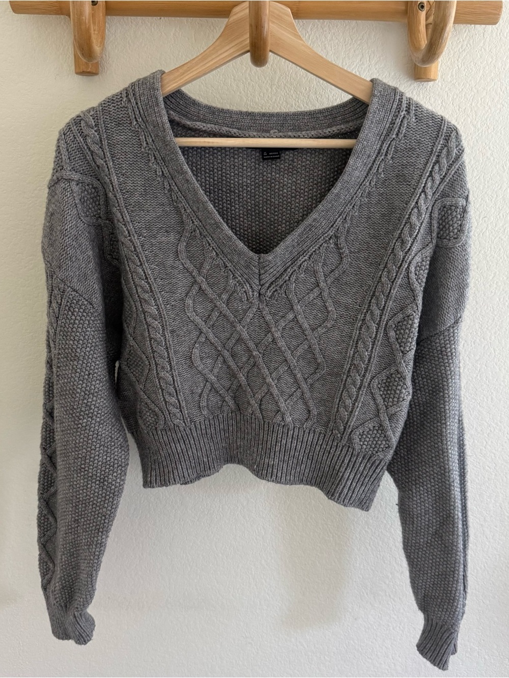 Preppy capsule wardrobe dark academia minimalist gray cable knit cropped sweater